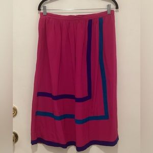 100% pure silk pink skirt. Size 14. Made in hongkong